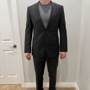 Men's Hugo Boss Suit. Navy stripe pattern. 40 Regular. 34 inch waist.